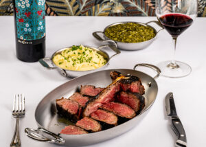 a Tbone steak with Mashed potatoes and creamed spinach